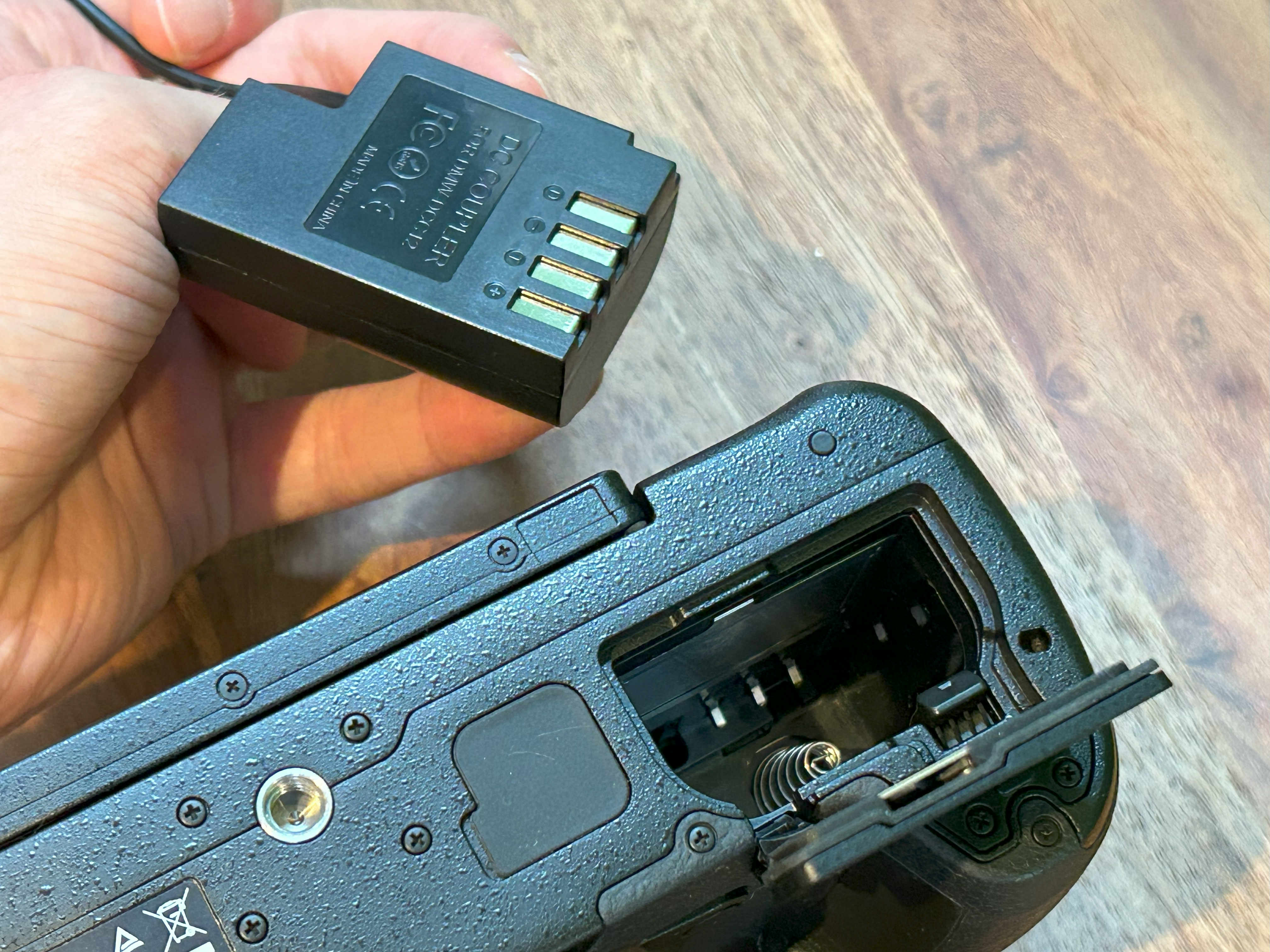 Dummy battery for my DC-GH5, and the battery slot where it goes